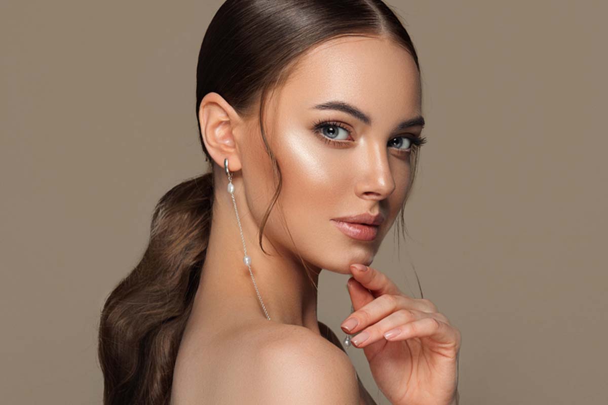 Woman with balanced facial proportions after ear surgery